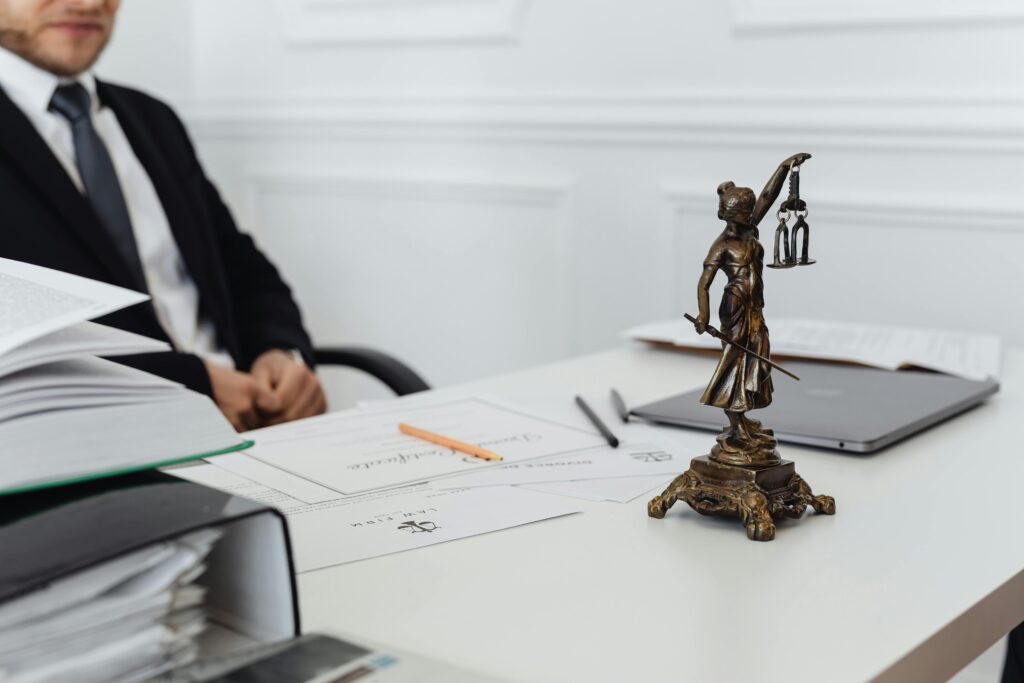 A lawyer seated at their desk in a law office